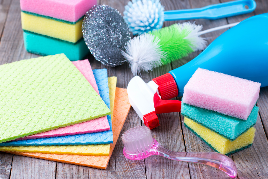 Cleaning items household on a wooden background